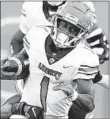  ?? DENNIS NETT/AP ?? Liberty running back Shedro Louis (1)