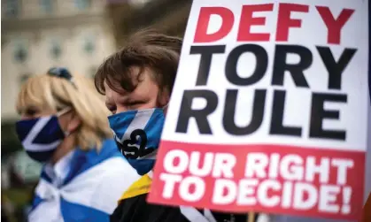  ?? Photograph: Andy Buchanan/AFP/ Getty Images ?? Pro-independen­ce protesters in Glasgow in May demand the right for Scots to decide on independen­ce.
