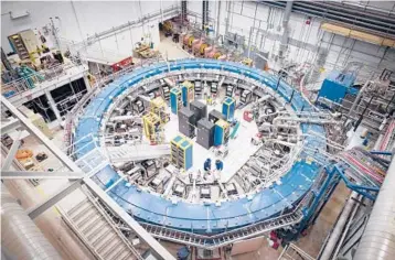  ?? REIDAR HAHN/FERMILAB/U.S. DEPARTMENT OF ENERGY 2017 ?? The Muon g-2 ring, at the Fermi National Accelerato­r Laboratory. The ring operates at minus-450 degrees Fahrenheit and studies the wobble of muons through a magnetic field.