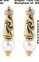  ??  ?? A pair of pearl and diamond dangling Bulgari earrings set in 18k yellow gold