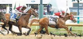  ?? WORD/GETTY GUNNAR ?? Rich Strike with Sonny Leon aboard wins the 148th running of the Kentucky Derby followed by Epicenter with Joel Rosario aboard at Churchill Downs on Saturday in Louisville, Ky.