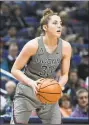  ?? Associated Press file photo ?? UConn’s Katie Lou Samuelson looks to pass during a recent game.