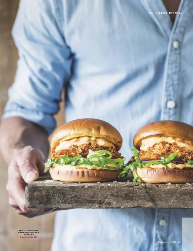  ??  ?? SPICY CORNFLAKE CRUMBED CHICKEN BURGERS