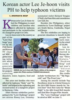  ??  ?? KOREAN star Lee Je-hoon with Filipino children at the mangrove project site (Photo courtesy of SARAM Entertainm­ent)