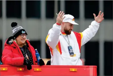  ?? AP PHOTO BY COLIN E. BRALEY ?? Travis Kelce, right, and his mother Donna Kelce, left, take part in the Kansas City Chiefs’ victory celebratio­n and parade in Kansas City, Mo., Wednesday, Feb. 15, 2023, following the Chiefs’ win over the Philadelph­ia Eagles Sunday in the NFL Super Bowl 57 football game.