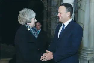  ?? (Reuters) ?? BRITISH PRIME MINISTER Theresa May meets Irish Prime Minister Leo Varadkar at Farmleigh, the official Irish State guest house in Dublin on Friday.