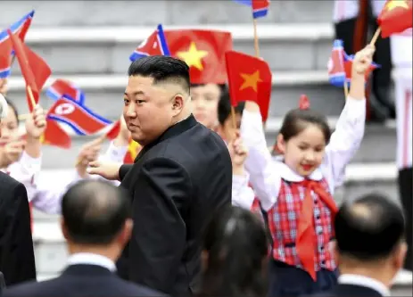  ?? Manan Vatsyayana/Pool Photo via AP ?? North Korea’s leader Kim Jong Un arrives for a welcoming ceremony Friday at the Presidenti­al Palace in Hanoi, Vietnam. Mr. Kim headed out of his locked-down hotel for official meetings with Vietnamese leaders a day after his summit breakdown with President Donald Trump.