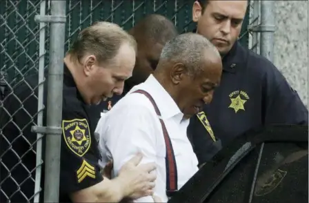  ?? MATT SLOCUM — THE ASSOCIATED PRESS ?? Bill Cosby departs after his sentencing hearing at the Montgomery County Courthouse, Tuesday in Norristown, Pa. Cosby left in handcuffs to begin serving a three-to-10 year prison sentence for sexual assault.