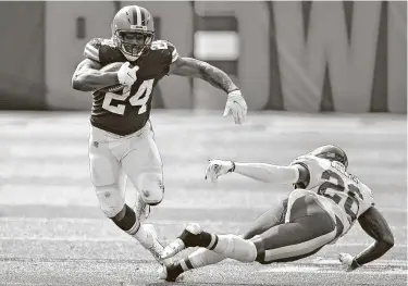  ?? Jason Miller / Getty Images ?? Browns running back Nick Chubb (24) had 335 yards on 57 carries, averaging nearly 6 yards per carry, before a knee injury. He’s healthy again and could be a major factor in Sunday’s game against the Texans.