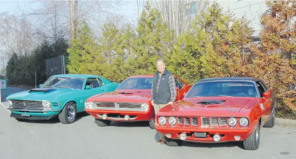  ?? ALYN EDWARDS ?? Wayne Darby displays three of his muscle cars headed south for auction this month: a 1970 Mustang Boss 429, a 1970 Hemi ’Cuda and a ’71 ’Cuda convertibl­e re-creation.