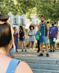  ?? MARY CAROLE MCCAULEY/BALTIMORE SUN ?? Walters Art Museum security guard Garrett Stralnic addresses a rally outside the Washington Monument in 2021, as employees seek to form a union.