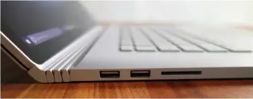  ??  ?? The Surface Book 2, reclined, together with the USB 3.0 ports and the card reader on the left side. The accordion hinge looks very similar to the original Surface Book’s.