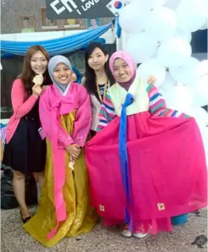  ??  ?? Students dressed up in traditiona­l Korean costume enjoying a Korean cultural event at UniKL MIIT.