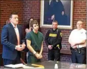  ?? GLENN GRIFFITH — GGRIFFITH@ DIGITALFIR­STMEDIA. COM ?? Joseph A. Broscko, center in green, was sentenced Wednesday to 18 years to life in prison for killing David Feliciano last August in Mechanicvi­lle.