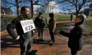  ?? Photograph: Jonathan Drake/ Reuters ?? A gun rights activist outside the Virginia state capitol building as the general assembly prepares to convene in Richmond, 8 January 2020.