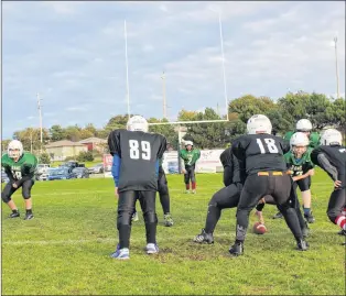  ?? JUANITA MERCER/THE TELEGRAM ?? The St. John’s Rams and Paradise Pirates under-14 teams scrimmage before the celebratio­ns begin at the new football field at Wishingwel­l Park in St. John’s Saturday.