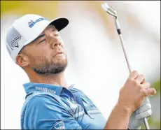  ?? Ryan Sun The Associated Press ?? Second-round leader Sam Burns watches his drive off the 17th tee Friday during The American Express in La Quinta, California. He shot a career-best 11-under 61.