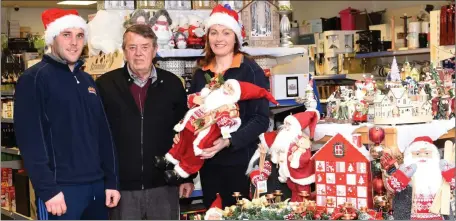  ??  ?? Chris Adair (centre) with James Moran and Aine McGill at O Shea’s Arro, Deelis, Cahersivee­n for all your Christmas decoration­s and presents.