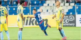  ??  ?? Bengaluru FC defender Nishu Kumar (centre) celebrates after scoring the team’s opening goal against visiting Abahani from Bangladesh in Bangalore on Tuesday.