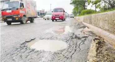  ??  ?? Mining companies carry heavy loads which usually damage the roads