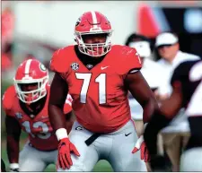  ?? File-JOSHUA L. JONES / The Associated Press ?? Georgia offensive lineman Andrew Thomas lines up for a play during the Bulldogs’ spring game back in April. Thomas is expected to start at left tackle this season.