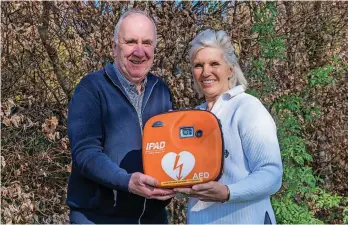  ?? ?? Lifesaving Lucy with Friends of Loch Lomond and Trossachs chair James Fraser