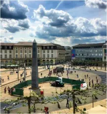  ??  ?? Nigerian artist Olu Oguibe’s 16m-tall obelisk in one of Kassel’s squares.