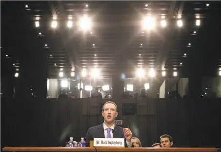  ?? Chip Somodevill­a / Getty Images ?? Facebook CEO Mark Zuckerberg testifies before a combined Senate Judiciary and Commerce committees hearing.