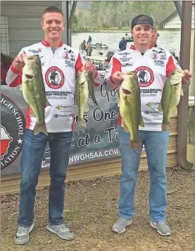  ??  ?? LFO’s Zach and Christian Vaughn show off some of the haul that earned them second place in the most recent NWGHSAA tournament at Weiss Lake in Centre, Ala. (Contribute­d photo) LaFayette girls 3, Ridgeland 0