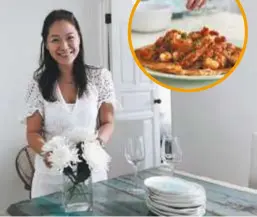  ??  ?? Annette Tan … the food writer has opened her home to diners; a dish of crispy mee siam prepared by Tan.