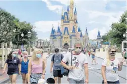  ?? JOE BURBANK/ORLANDO SENTINEL ?? Walt Disney Co. revealed Tuesday it is laying off 28,000 U.S. employees, including some at Walt Disney World, due to the coronaviru­s pandemic.