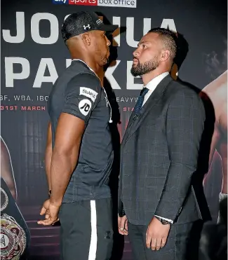  ?? PHOTOSPORT ?? Joseph Parker fighting Anthony Joshua, left, is arguably the biggest one-off sports event of the year for Kiwis.