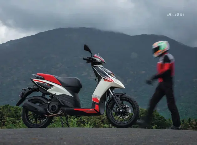  ??  ?? Left: Sticky tyres and high ground clearance makes for good lean angles. Above: The SR 150 is sporty in the truest sense of the word.
Right: Minimalist­ic dash gets carbonfibr­e inserts; front disc is feelsome
and has good bite