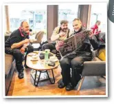  ??  ?? L-R: Critchell, Berryman and tester Neeves warm up with a brew and the latest news!