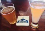  ?? JESSICA YADEGARAN — BAY AREA NEWS GROUP ?? Lodi’s Idol Beer Works specialize­s in Germanic-style beers and IPAs. Pictured here, the Hugh Hefe hefeweizen and Idol-Ade, a non-alcoholic kombucha.