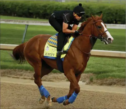  ?? THE ASSOCIATED PRESS ?? Kentucky Derby entrant Justify trains at Churchill Downs Thursday, May 3, 2018, in Louisville, Ky. The 144th running of the Kentucky Derby is scheduled for Saturday, May 5.