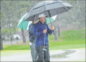  ?? ?? Brooks Koepka was at 13-under and faced a 10-foot par putt on the seventh green when third-round play was suspended Saturday.