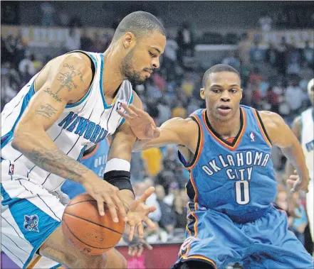 ?? [2009 AP FILE PHOTO/BILL HABER] ?? Imagine a Thunder team a decade ago that had Tyson Chandler (left) playing alongside Russell Westbrook (0) instead of against him.
