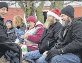  ?? FRAM DINSHAW/TRURO NEWS ?? Wagon passengers enjoy a relaxed horse-drawn ride through the forests near upper Onslow on Dec. 15.