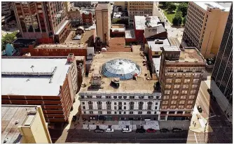  ?? TY GREENLEES/STAFF ?? Dayton Arcade properties are shown along Ludow Street. Key project components — like the innovation hub, rotunda and first-floor retail — are targeted to open in the end of 2019 or early 2020.