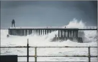  ?? PICTURE: CERI OAKES. ?? ROUGH WATERS: Whitby was flooded in January this year because of a tidal surge. A further alert is in place there for today.