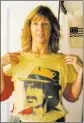  ?? COURTESY CATHY ORFE ?? Cathy Orfe shows her favorite concert T-shirt, featuring Frank Zappa.