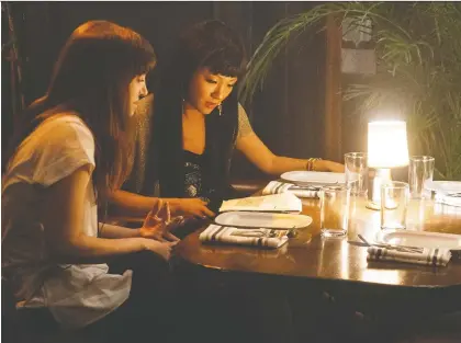  ?? STX FILMS ?? Hustlers, a new movie by director Lorene Scafaria, left, and starring Constance Wu, tells the story of strippers who steal from their clients.