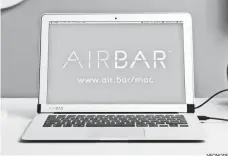  ??  ?? NEONODE The AirBar is meant to blend in on a 13.3-inch MacBook Air.