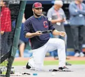  ?? DAVID DERMER/AP ?? Edwin Encarnacio­n, who returned to the Indians’ lineup for Game 5, waits to take batting practice Tuesday.