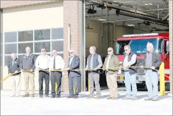  ?? Courtesy photo/Cassi Lapp, Communicat­ions Director ?? An uncoupling ceremony was held at the new Fire Station No. 3 on Monday. Pictured at the ceremony are (from left) City Clerk Wayne Jertson, IT Director John Moeckel, Deputy Chief Bryan Wolfgang, Fire Chief Steve Sims, Mayor Peter Christie, Council Member Steven Bourke, Jackson Brown Palculict architect Bunny Brown, Clinard Constructi­on Superinten­dent Casey Roberts and Constructi­on Manager Mark Clinard.