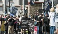  ??  ?? Trade unionists march against the attack on penalty rates.