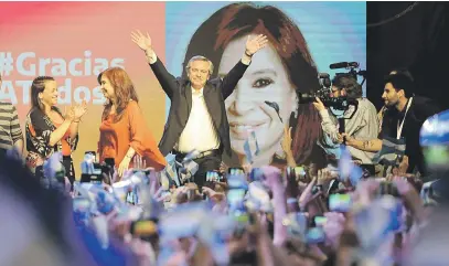  ?? Picture: EPA- EFE ?? DIFFICULT ROAD. President- elect of Argentina Alberto Fernandez celebrates with his supporters after winning Argentina’s general election in Buenos Aires on Sunday. Fernandez takes office on December 10.