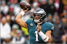  ?? MATT SLOCUM/AP ?? Eagles QB Jalen Hurts was a second-team All-pro and finished second in MVP voting after tying a franchise record with 35 combined TD passes and runs despite missing two games.