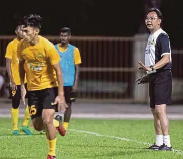  ??  ?? Ong Kim Swee’s (right) under-22 squad will play China’s under-22 team in Xiangtan on Sunday.